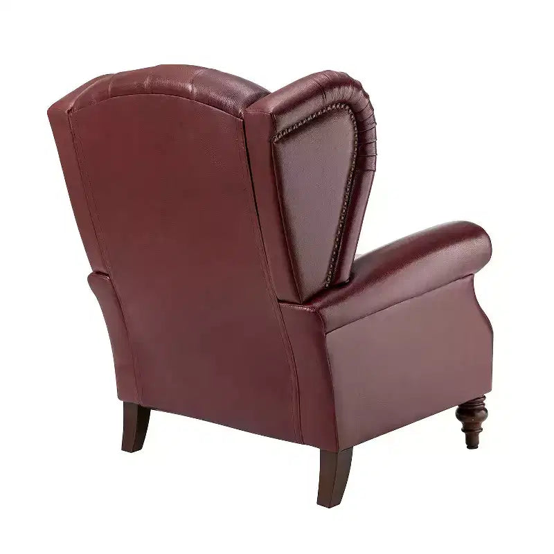Poltrona a pozzetto larga 84 cm in vera pelle con gambe coniche in legno massello e bordo con borchie