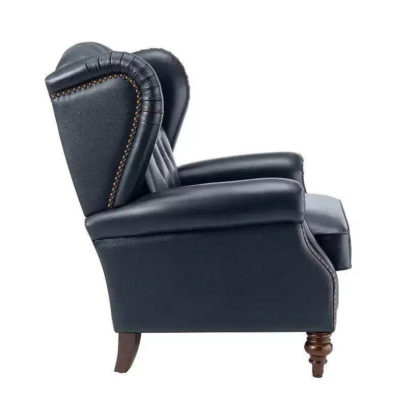 Poltrona a pozzetto larga 84 cm in vera pelle con gambe coniche in legno massello e bordo con borchie