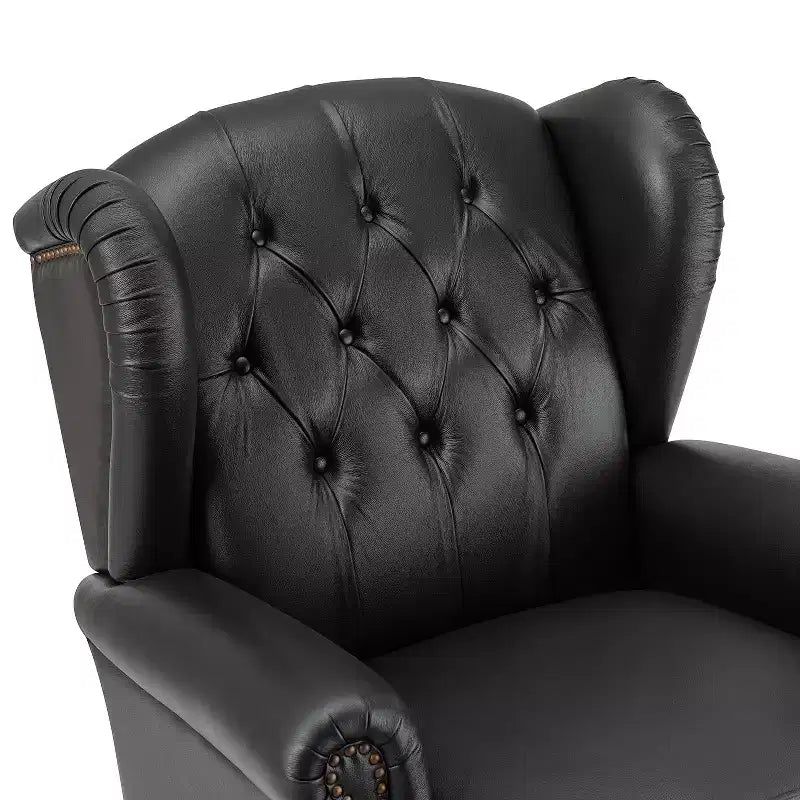 Poltrona a pozzetto larga 84 cm in vera pelle con gambe coniche in legno massello e bordo con borchie