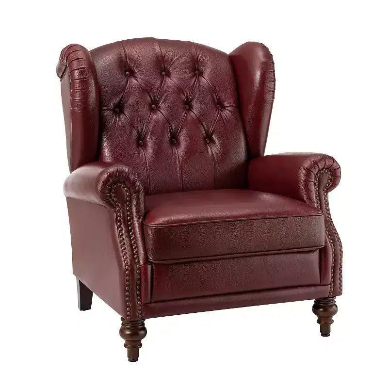 Poltrona a pozzetto larga 84 cm in vera pelle con gambe coniche in legno massello e bordo con borchie
